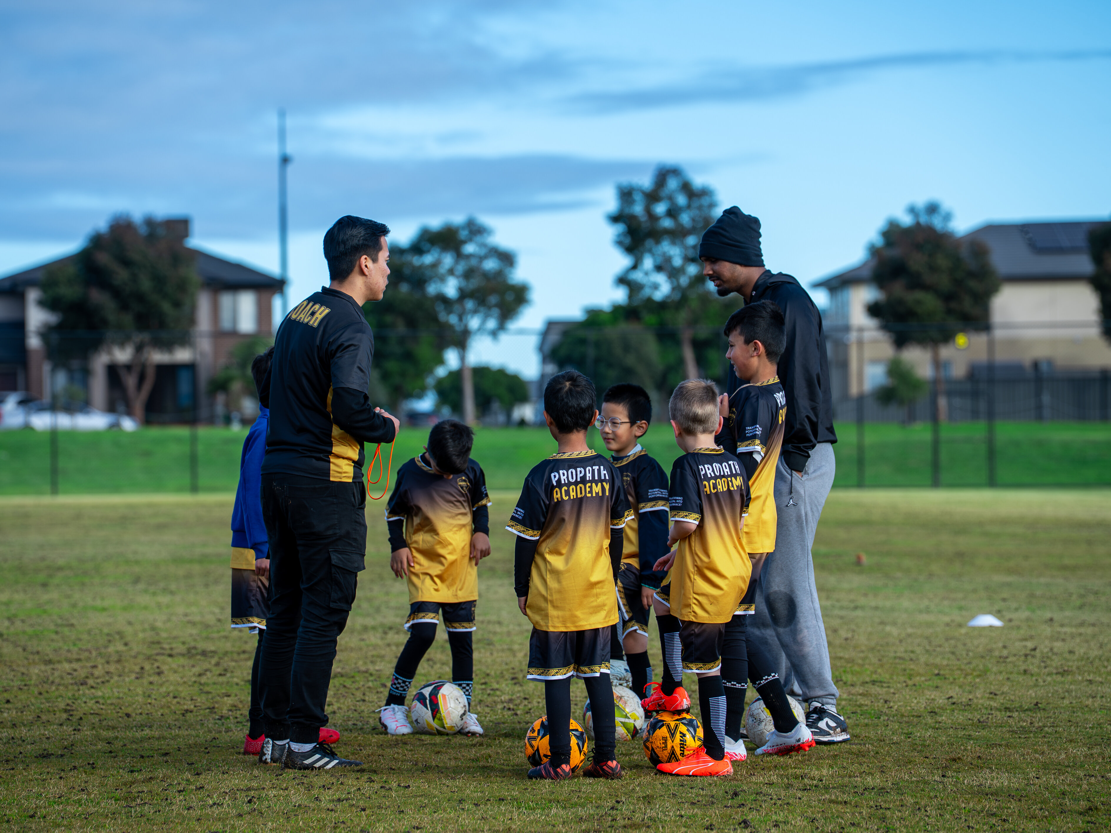 ProPath Academy players listening to coaches during a group session